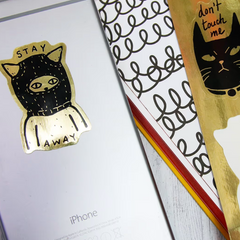 Gouden sticker op een iphone