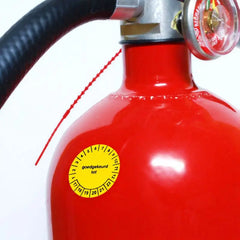 Keuring stickers op een brandslang